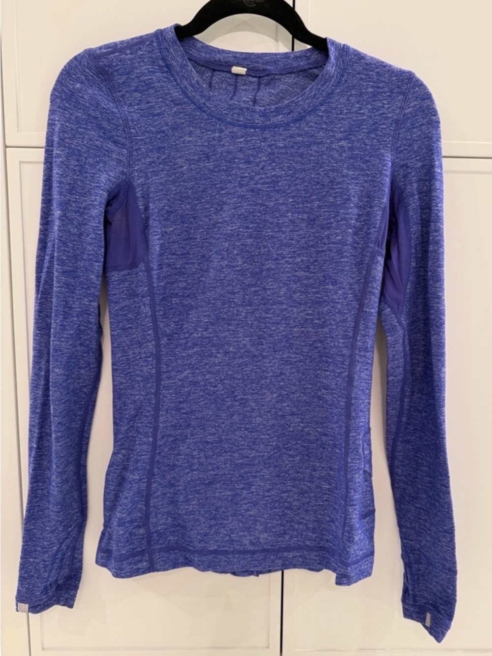 lululemon heathered Blue size 6 long sleeve top. Ruffle down back. Thumb holes